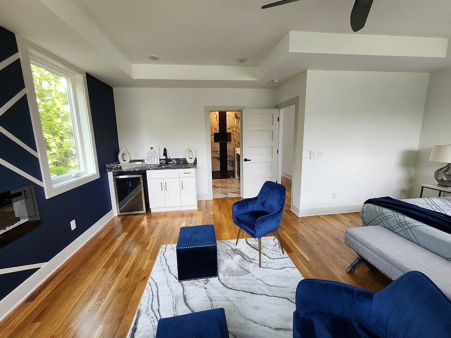 Master Bedroom Suite with Wet Bar and En-Suite Bath