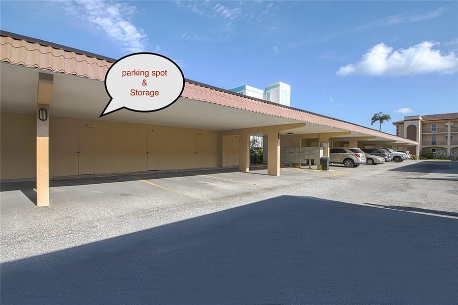 One covered parking space plus uncovered parking spaces adjacent to the street.