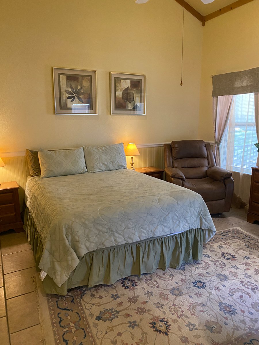 Bedroom Two.  Walk in closet and en suite bathroom.  Big screen TV.