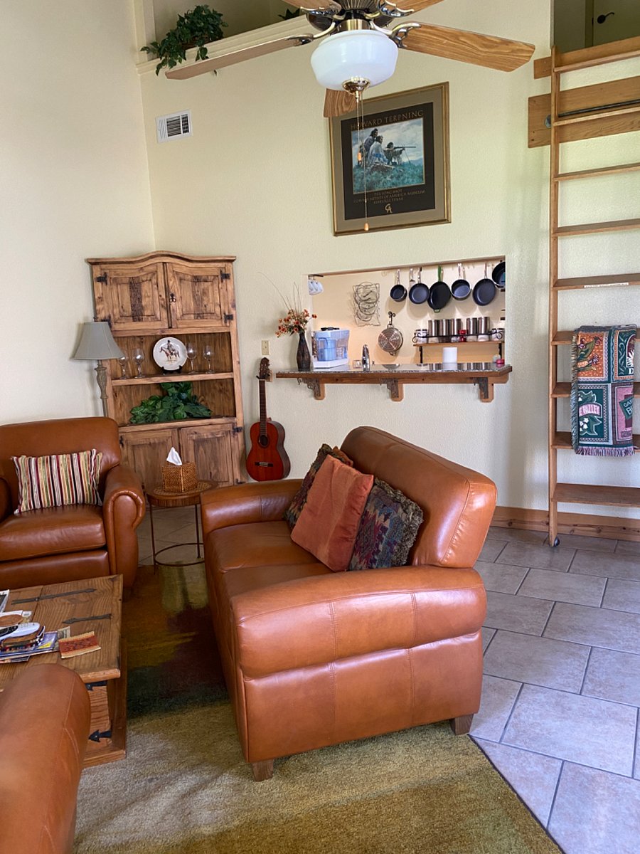 Living area, breakfast bar and pass through to kitchen.