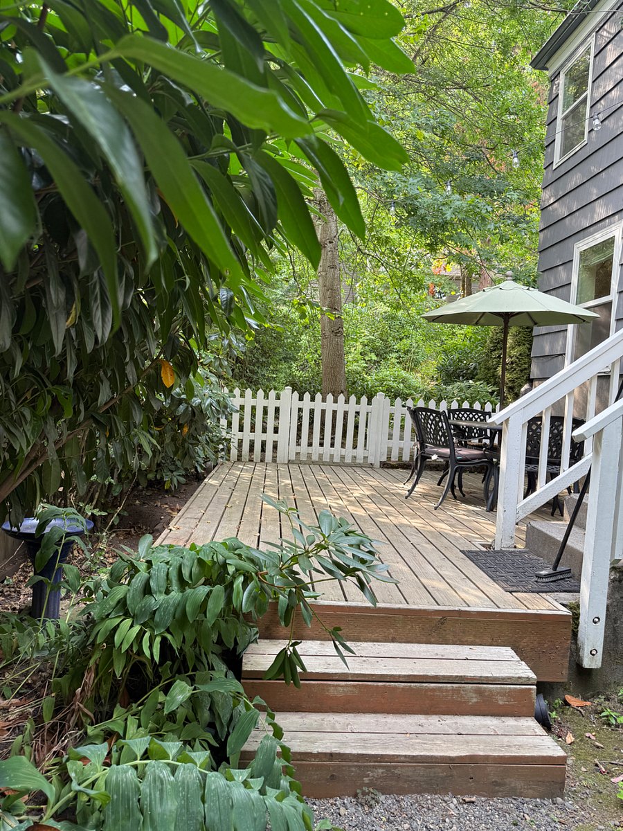Patio with Seating and Umbrella