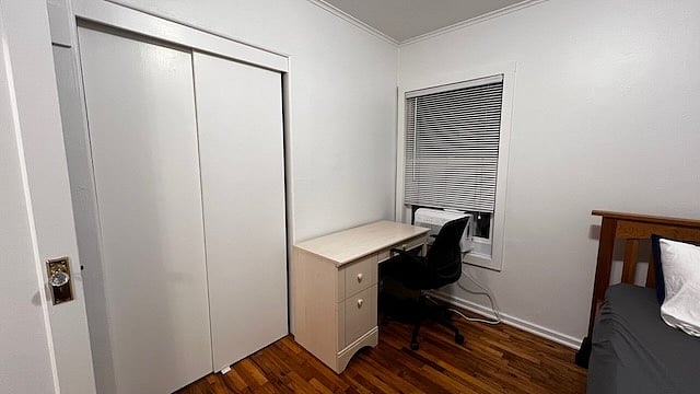 Bedroom 2: Twin bed, desk and office chair.