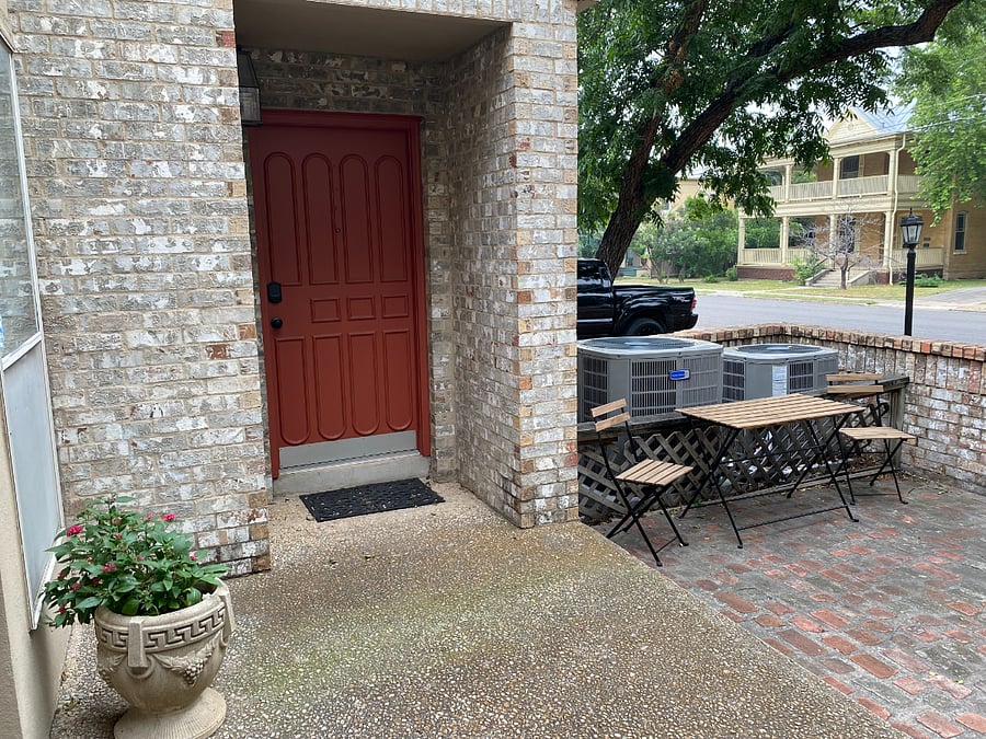 View from outside entry (small outdoor table and chairs belong to this unit)