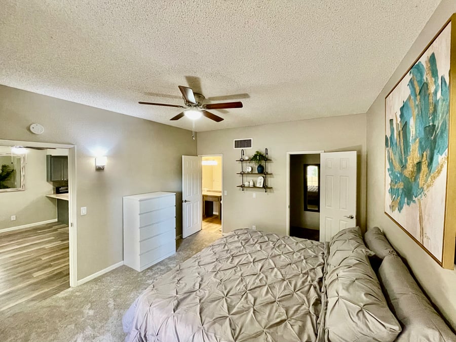 Bedroom Doors with access to Living Room, Bathroom, & Walk-in Closet. 