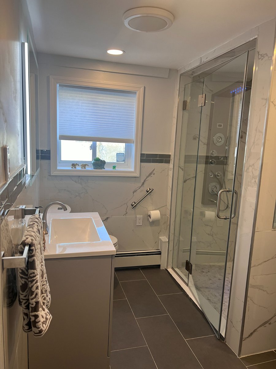 Indulge in the luxury of our newly renovated bathroom oasis, featuring a rejuvenating rain shower and multiple shower heads for the ultimate relaxation experience. This shared bathroom is impeccably maintained, with complimentary toilet paper always stocked and rarely used by other occupants. Ideal for traveling nurses seeking a tranquil retreat after a long shift.