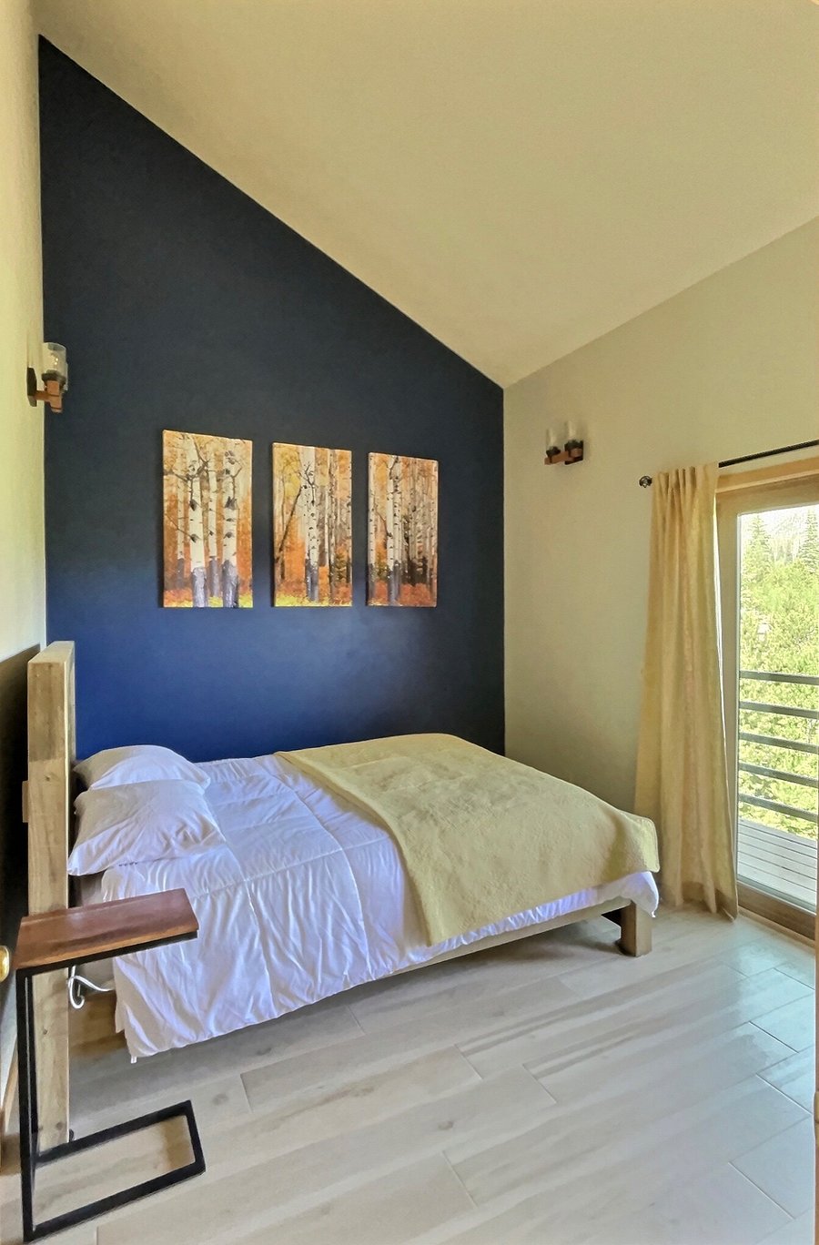 Master bedroom with in-suite bathroom and private back deck.