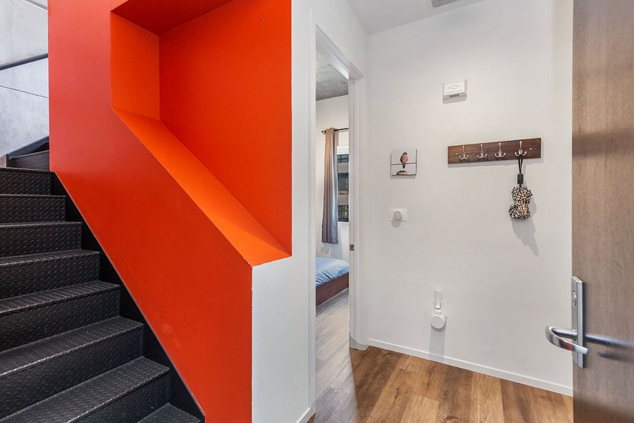 Entry into condo; both bedrooms off the entry floor.
