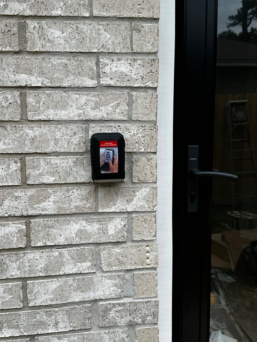 Lockbox with key for emergency entry