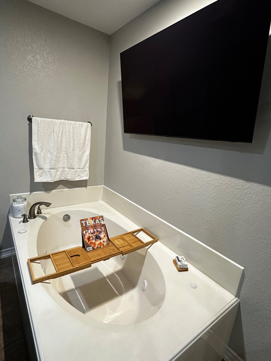 Relax in the jacuzzi tub with bath salts, & tub caddy.  
