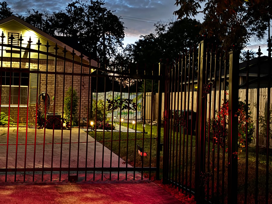 Gated property, with guest parking to the right. Extra parking exterior to the gate, but off street. 