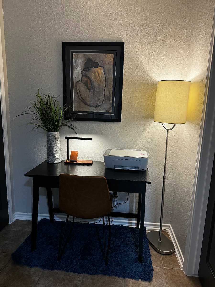 Dedicated workstation with phone charger, lamp, & air printer. 
Olton Lifftmaster gate opener for Guests