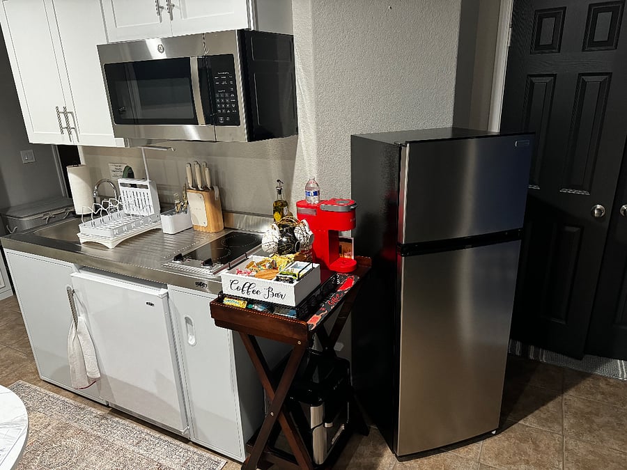Kitchenette, coffee bar, & full sized fridge