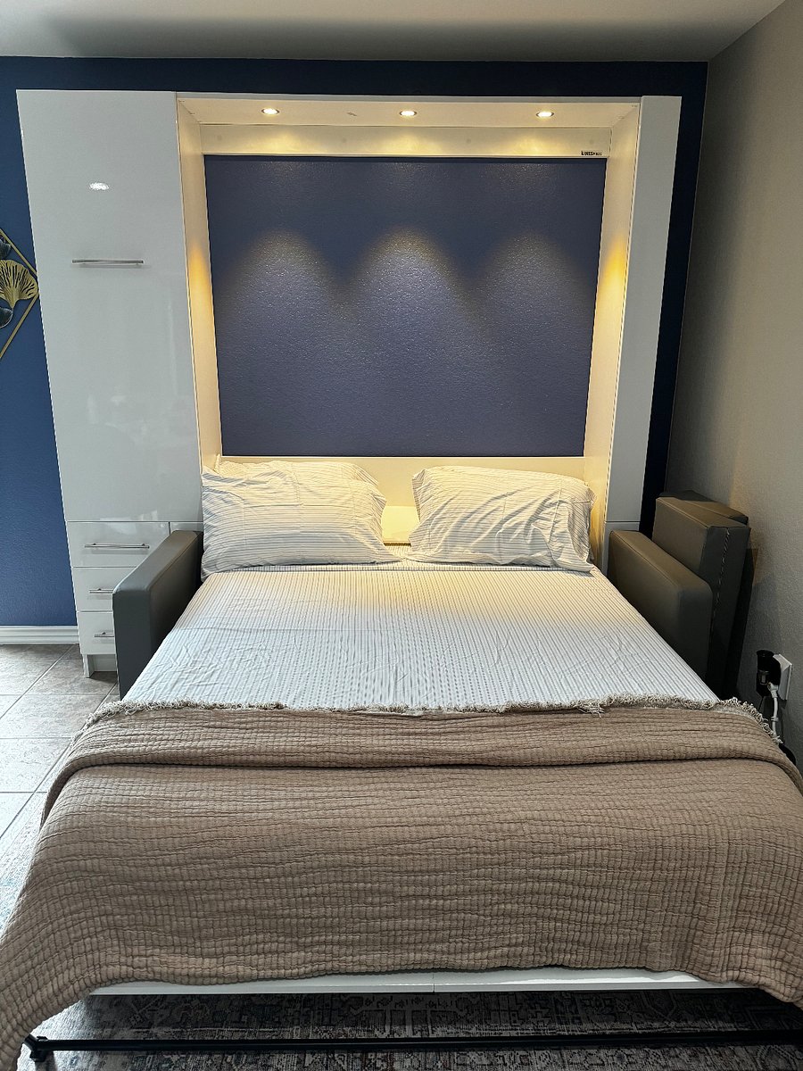 Queen BredaBeds Murphy bed with overhead lighting. 