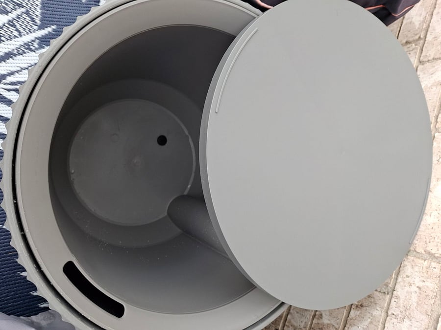 This patio table is multi-functional, the lid swivels to place ice & beverages. 