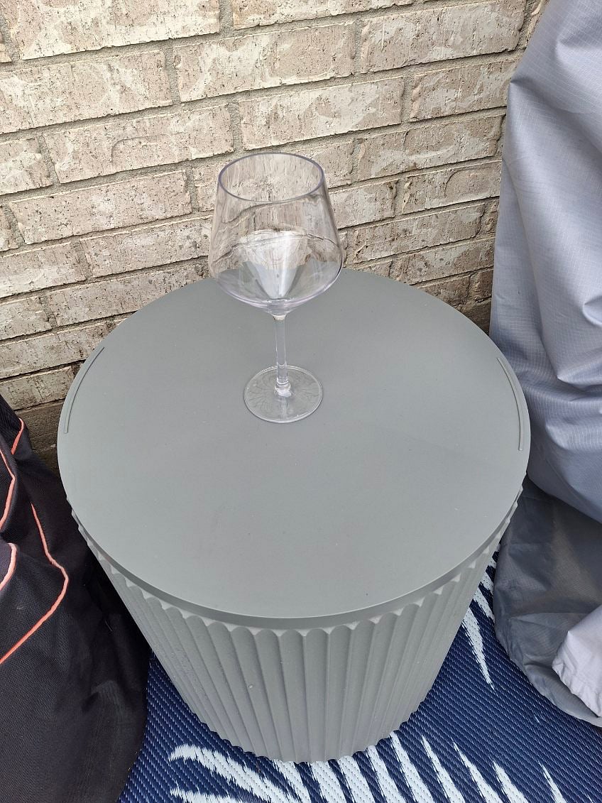 Patio table
The lid swivels so guest could load ice & beverages