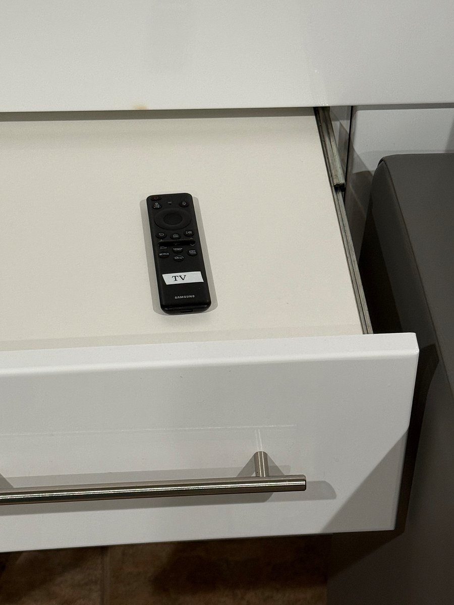 TV Remote on nightstand. Kept in bedside top drawer