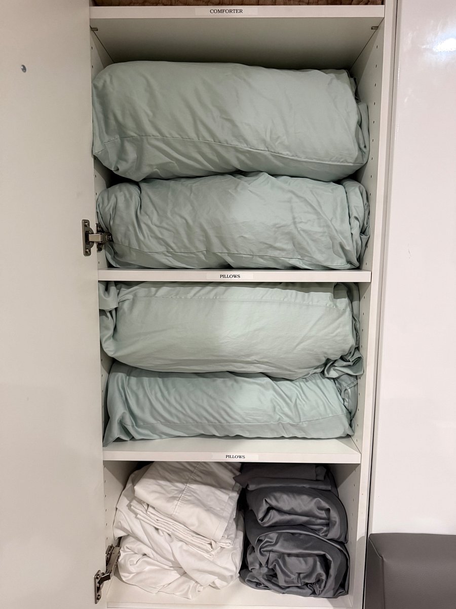 Pillows in storage of bed