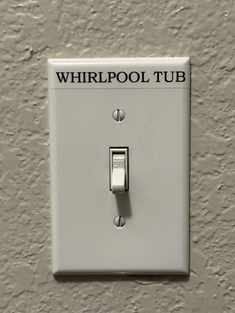 Switch to turn on the jacuzzi tub. Located in the bathrolm