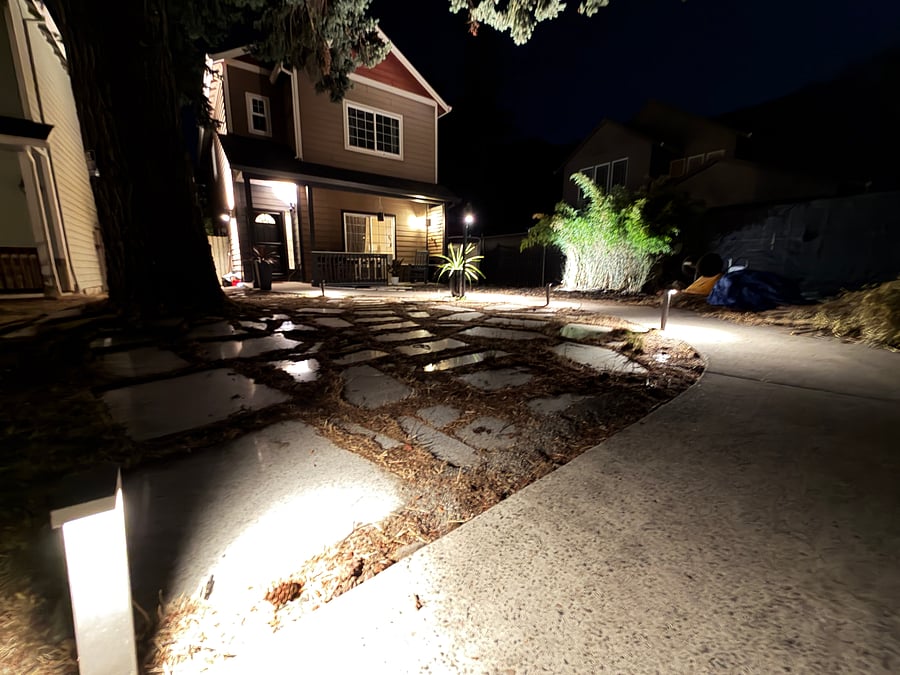 Front of house during evening-approaching the property