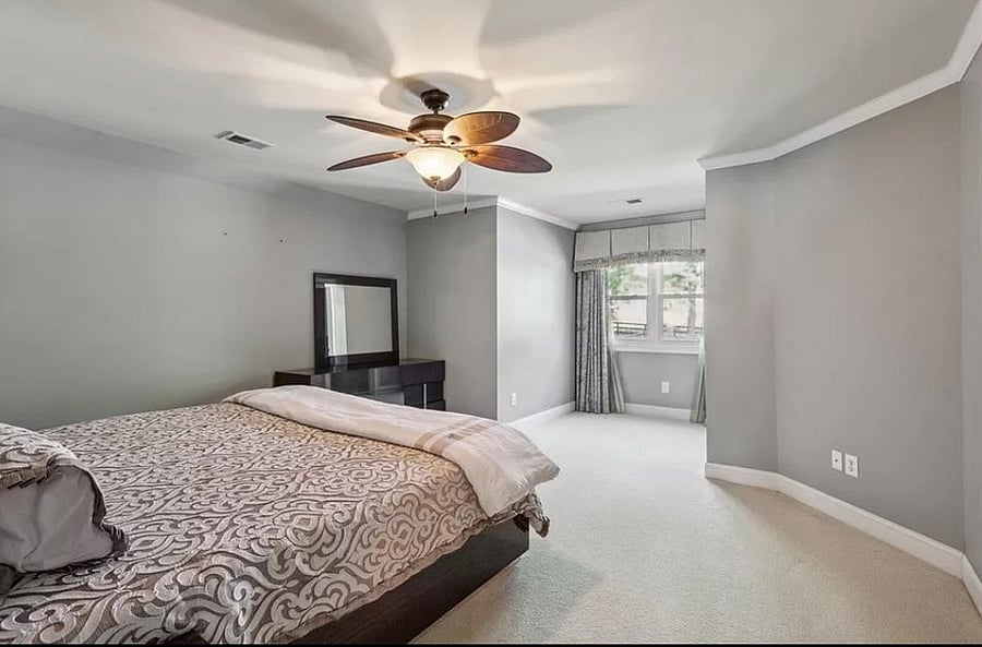 Upstairs Bedroom #2 w private bathroom w window overlooking pool and tennis court