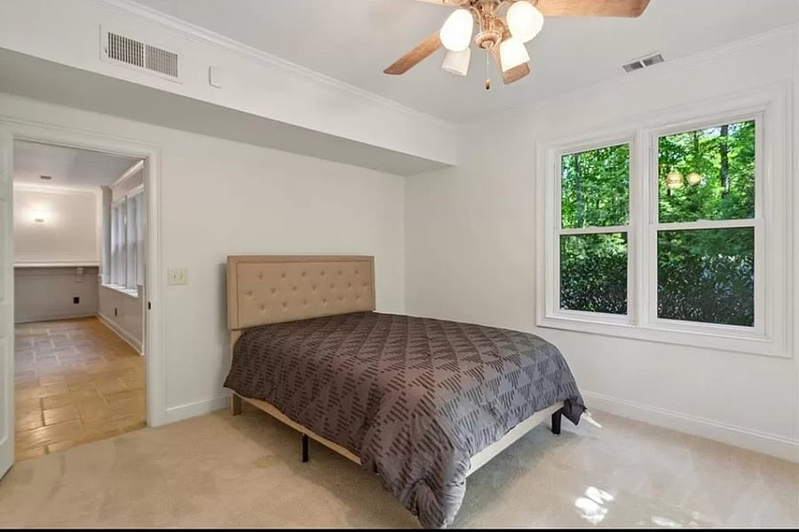 downstairs bedroom on terrace level; separate entrance; own bath, living room, kitchen, gym and movie theater available