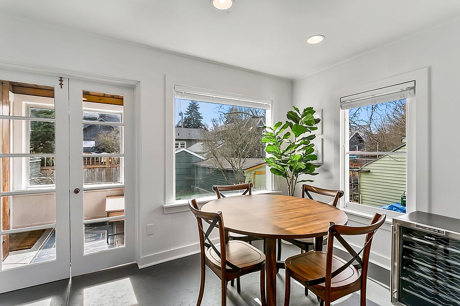 Eat in kitchen w/ large, south facing windows and wine fridge!