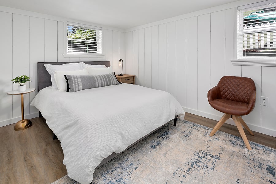 3rd bedroom is downstairs w/ queen bed, full length mirror, dresser & closet space
