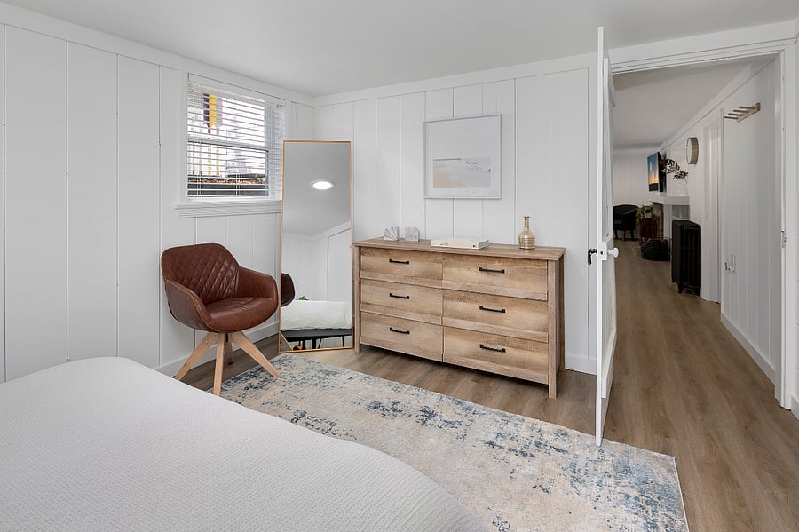 3rd bedroom w/ queen bed, full length mirror, dresser & closet space