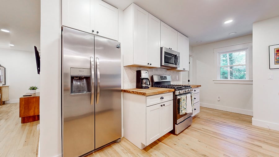 Kitchen stove, microwave and refrigerator