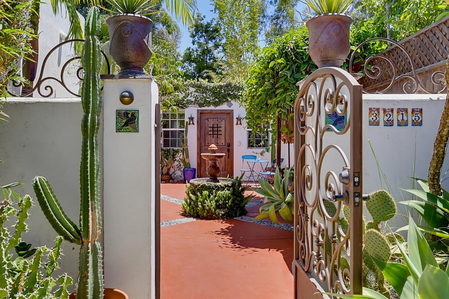 Locking courtyard gate with classic Spanish Revival character