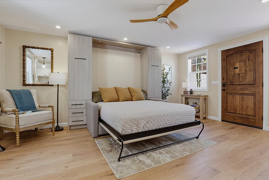 Queen Murphy bed folds down for restful, full-size sleep