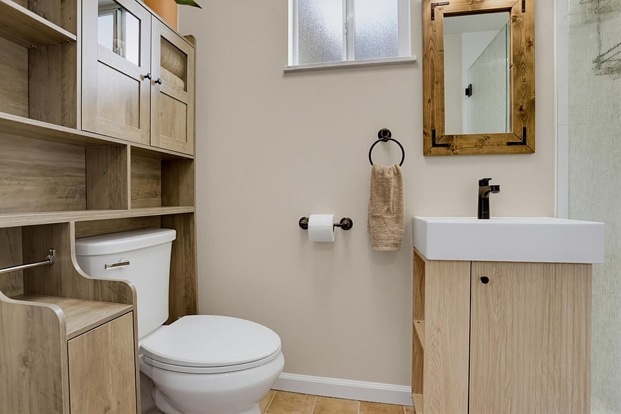 Remodeled bath with ample built-in storage
