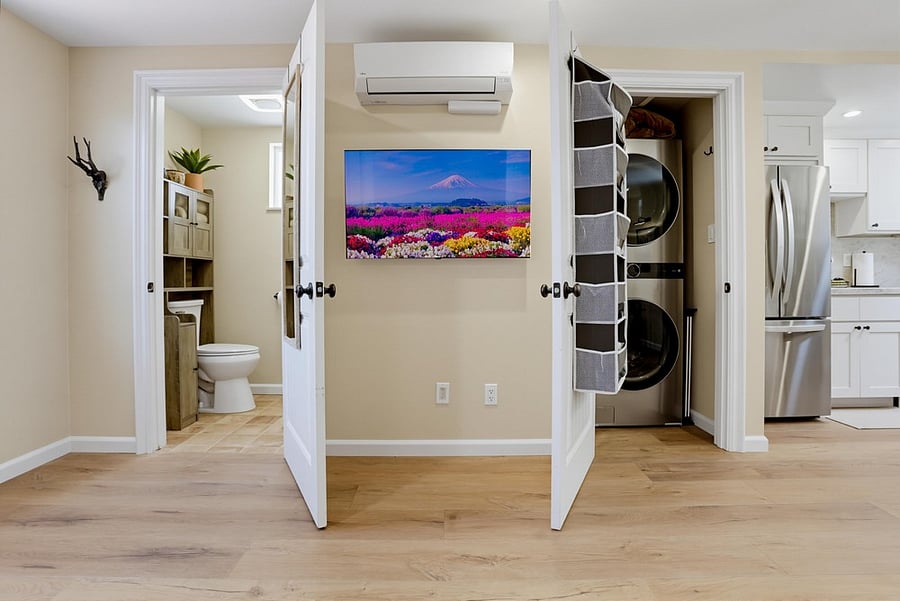 Open studio layout with bath and laundry access