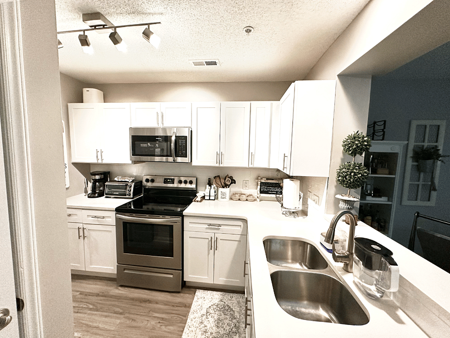 Bright and Modern with stainless steel appliance. 