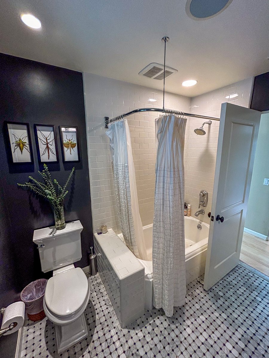 Upgraded bath with tub for soaking.