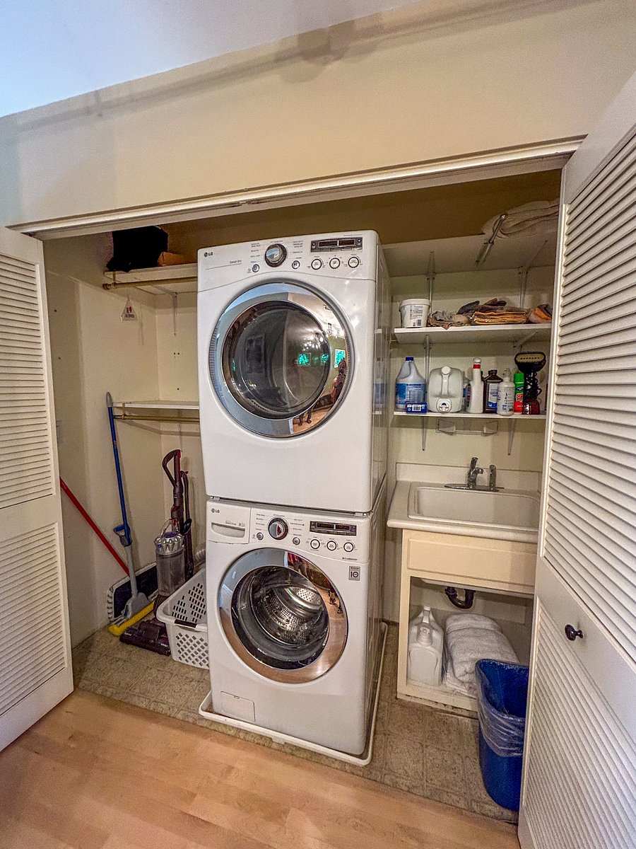 Gas powered dryer and washer located in the laundry cabinets in the home.