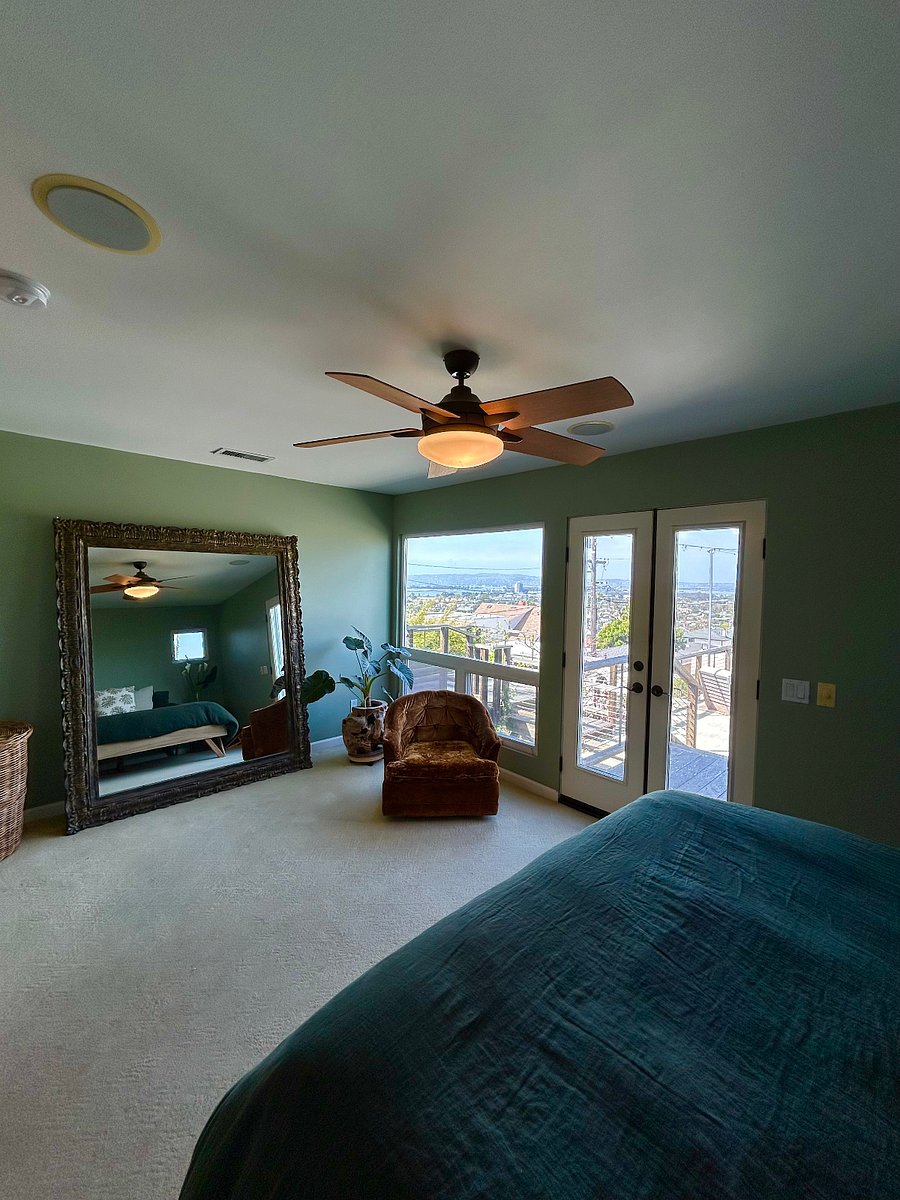 Amazing bay and ocean views from the primary bed. Wake up every morning to a great beach day.