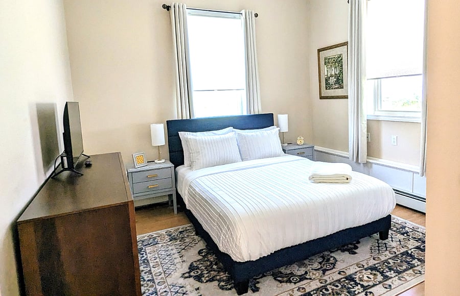 Primary Bedroom with Queen Bed & 32-inch Smart TV