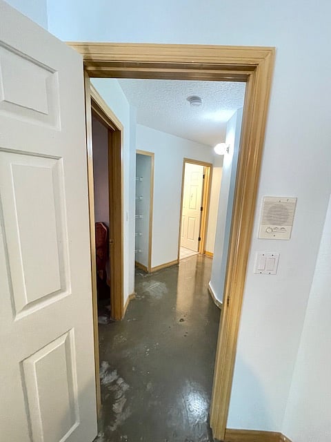 Hallway walkway towards bathroom and bedroom
