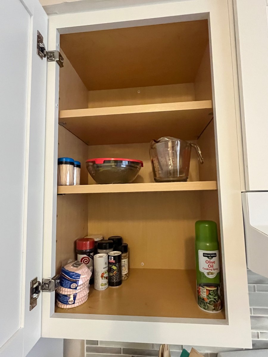 Some basic spices for cooking, along with some kitchenware.