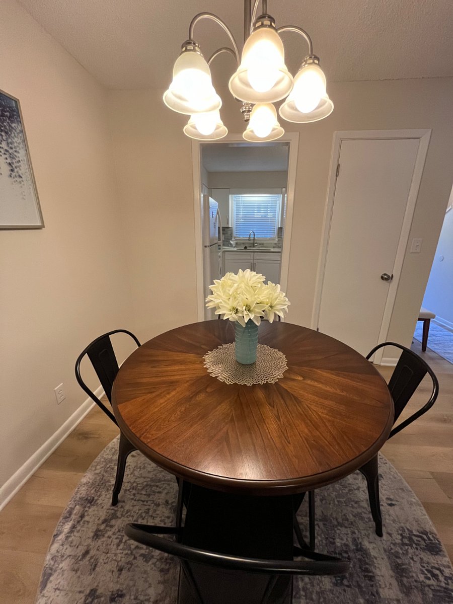Dining table looking into the kitchen.