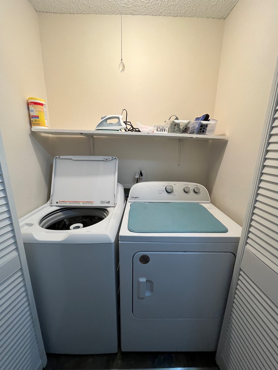 Laundry area in the upstairs hallway.
