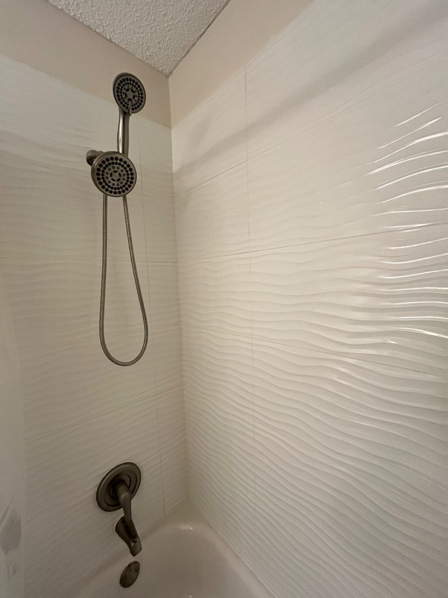 Two head shower combo, with detachable shower wand.