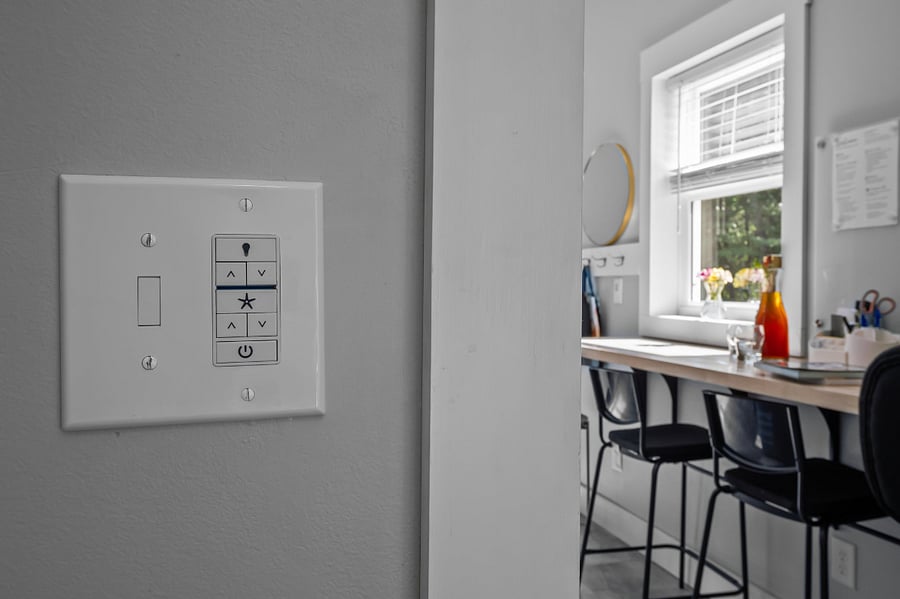 Ceiling fans in both the bedroom and living room help keep the apartment cool and breezy (in addition to the central heating & a/c and your own thermostat to control it). Also, this control handles the light, which is dimmable.