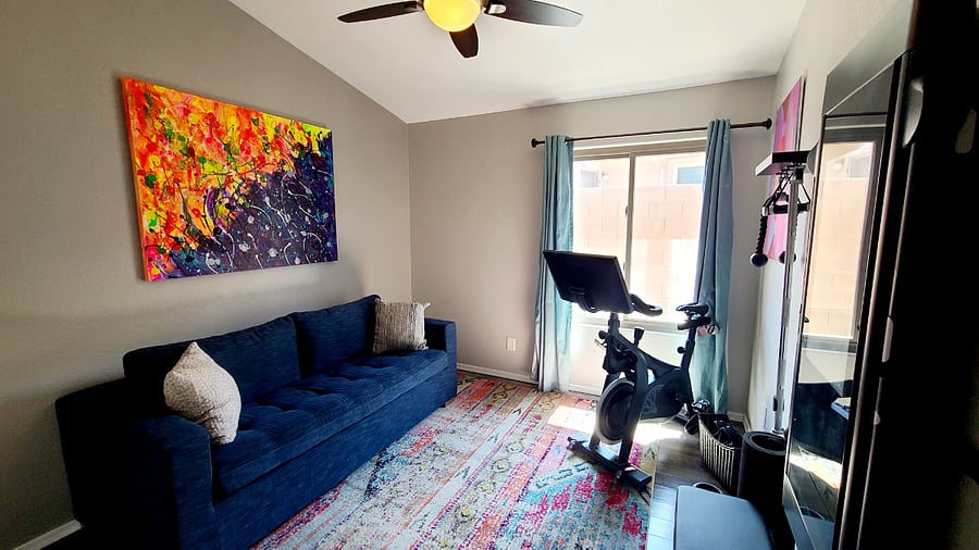 Wind down post-workout on our comfy sofa in the Movement Room. It's the perfect space to relax and rejuvenate after a satisfying exercise session, creating a seamless transition from fitness to relaxation.