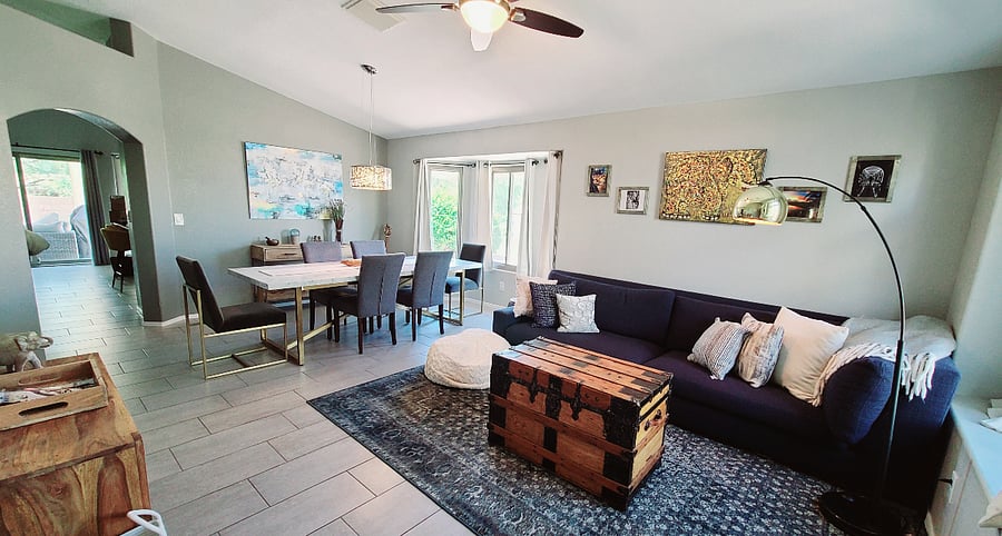 Experience seamless flow in our open floor plan, where the cozy living room transitions effortlessly to the dining room, kitchen, and entertainment area. It's a space designed for effortless connection and comfort for you and yours.
