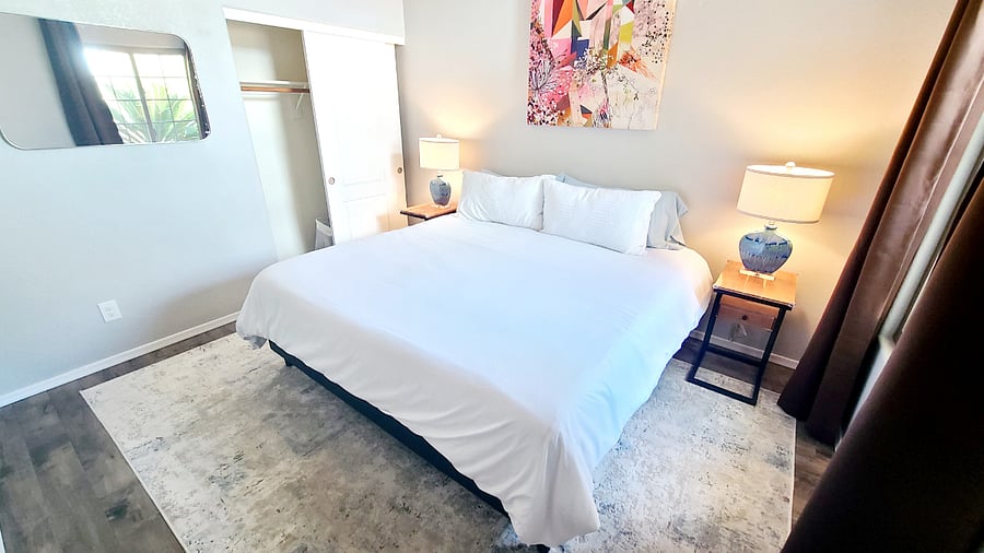Enjoy maximum comfort in the Tranquil Time bedroom with a spacious king-sized bed, providing ample room for guests to spread out and unwind. It's the perfect retreat for relaxation and peaceful moments.