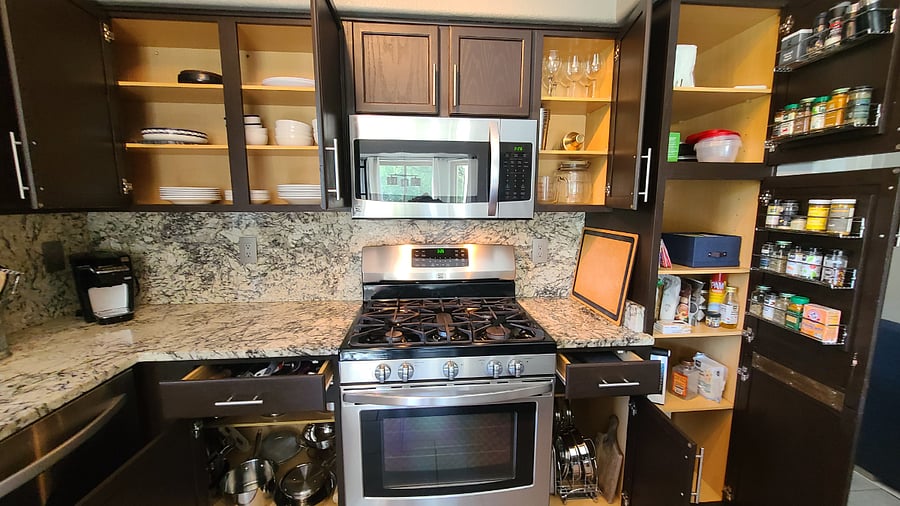 Kitchen is fully equipped to meet your culinary needs, boasting a complete set of pots & pans, a diverse selection of spices, & a comprehensive range of small kitchen appliances and gadgets. It's a chef's haven ready for all your cooking adventures.