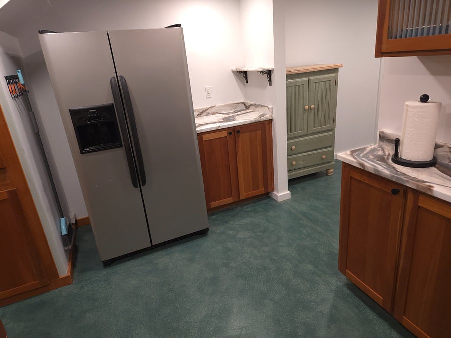 Full size fridge/freezer.  Coffee maker, toaster oven, toaster, etc. not shown.  