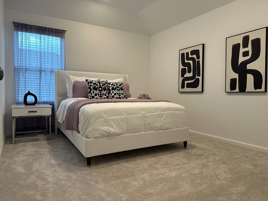 Beautiful and modern bedroom with a queen bed.